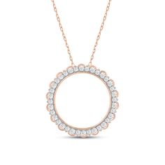 a rose gold necklace with diamonds in the center and an open circle design on it