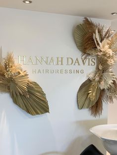 the hairdressing shop has been decorated with palm leaves