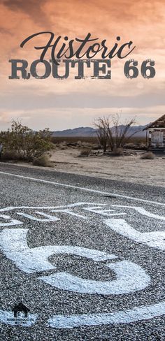 an old route 66 sign painted on the road