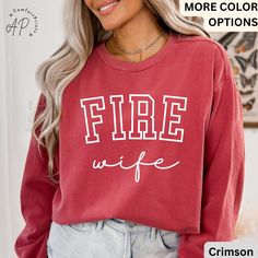 Firefighter Wife Comfort Colors® Sweatshirt, Fireman Wife Sweater, Wife of Firefighter Shirt, Gift for New Fire Wife T-Shirt ----------------- APComfortPrints are made with premium quality materials to fit your needs. Everything is printed in the USA. - Feel free to message me if you have any questions. ----------------- Product Details: Unisex Comfort Colors® 1566 Sweatshirt *80% ring-spun cotton, 20% polyester *Medium-heavy fabric (9.5 oz /yd² (322.1 g/m *Relaxed fit *Sewn in twill label *OEKO Wife Sweater, Embroidering Machine, Fire Gear, Firefighter Shirt, Fire Wife, Fire Life, Firefighter Shirts, Firefighter Wife, Comfort Colors Sweatshirt