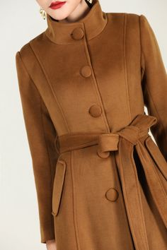 "This brown wool coat gives you the fall winter feels! Everything you need in a perfect midi wool coat is here. The wool coat to wear this season to work events, and out and about town....and now the search is over! It has been meticulously tailored with superior wool fabric that will keep you warm all season long. Every woman needs a wool coat in her wardrobe! DETAIL * Perfect Match with your favorite leggings, black slacks, denim jeans, etc * 50% wool blend, 50% fiber,nylon * Fully satiny lini Brown Single-breasted Pea Coat For Winter, Single Breasted Brown Pea Coat For Winter, Brown Wool Coat With Button Closure, Brown Double-breasted Winter Pea Coat, Brown Double-breasted Pea Coat For Winter, Brown Long Pea Coat For Winter, Brown Wool Coat With Button Closure For Winter, Winter Brown Wool Coat With Button Closure, Single-breasted Brown Wool Coat For Fall