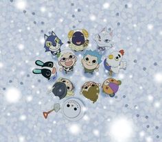 an assortment of cartoon characters on a snow covered surface with sparkles in the background