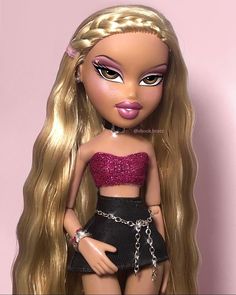 a barbie doll with blonde hair wearing a pink top and black skirt, standing in front of a pink wall