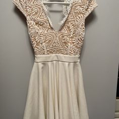 Cream Color Lace Dress Cream V-neck Mini Dress For Party, Stretch Lace Dresses For Cocktail, Stretch Lace Cocktail Dress, Chic Lace Fit And Flare Mini Dress, Cream Fitted Lace Dress With V-neck, Chic Fit And Flare Lace Mini Dress, Chic Stretch Lace Dress For Summer, Lace Stretch Dresses With Short Sleeves, Lace Short Sleeve Stretch Dress