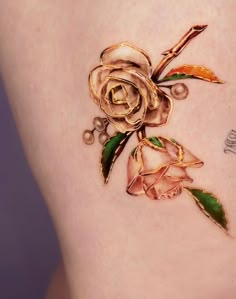 #flowertattoo #koreatattoo #seoultattoo #nyctattoo #jewelflowertattoos #flowerjewellery #flowerjewelrytattoo Metal Flower Tattoo, Rose Gold Tattoo Ink, Gold Tattoo Ink Permanent, Golden Flower Tattoo, Jeweled Tattoos, Gold Tattoo Ideas, Gold Rose Tattoo, Jewel Tattoo Gem, Gold Tattoo Design