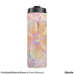 a pink and yellow flower is on the side of a stainless steel tumbler cup