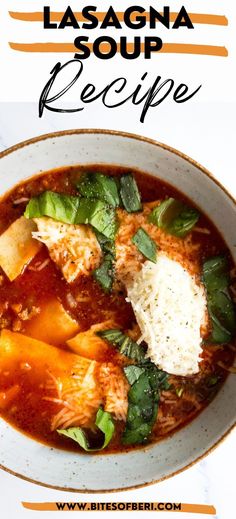 a bowl of lasagna soup with cheese and spinach on top, in front of a white background