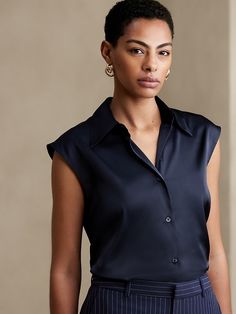 Semi-formal Sleek Collared Blouse, Semi-formal Collared Blouse With Placket, Elegant V-neck Shirt With Back Button Closure, Elegant Workwear Blouse, Elegant Office Wear Blouse With Placket, Elegant Workwear Blouse With Placket, Chic Collared Top For Semi-formal Occasions, Fitted Versatile Blouse With Button Closure, Versatile Fitted Blouse With Button Closure