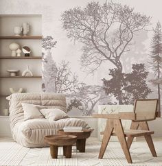 a living room with a couch, chair and wall mural in the background that has trees on it