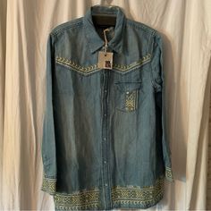 Nwt Ser.O.Ya Snap Front Denim Shirt W/Embroidery Details. Snap Cuffs. 30.5” Shoulder To Hem 22” Pit To Pit Spring Embroidered Tops For Rodeo, Western Style Blue Tops For Spring, Blue Shirt For Spring Rodeo, Blue Shirt For Rodeo In Spring, Light Wash Denim Tops For Rodeo, Blue Denim Tops For Rodeo, Western Style Washed Tops For Spring, Blue Shirt For Summer Rodeo, Blue Summer Shirt For Rodeo