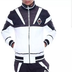 Bnwt Men’s Le Tigre Lightweight Track Jacket 100% Authentic Guarantee Black & White Small; Xl Color Block Style Full Zipper With Tiger Logo Pull Closure Stand Collar Long Sleeves Two Slip Pockets On Front Interior Slip Pocket Le Tigre Print On Back Le Tigre Rubber Patch Appliqu On Left Chest Inner Mesh Lining Details Ribbed Multi-Color Neck; Cuffs & Hem Measurement: Size Pit To Pit Length S 20 ½" 26 ½" M 21" 27" L 22 ½" 28 ¾ Xl 23 ½ 29 ½ White Nylon Track Jacket For Winter, White Sporty Nylon Track Jacket, White Nylon Sporty Track Jacket, Casual Fitted White Windbreaker, White Nylon Track Jacket Sportswear, White Fitted Casual Track Jacket, White Nylon Sports Outerwear, Casual Fitted White Track Jacket, White Nylon Outerwear For Sports