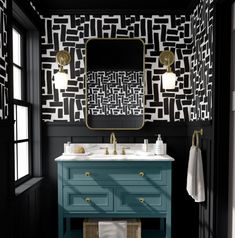 a bathroom with black and white wallpaper, blue vanity and gold accents on the mirror