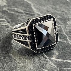 Square Black Garnet Gemstone Silver Ring , Embroidered Knitted Pattern Ring , 925K Sterling Silver , Handmade Geometric Style , Gift For Him , Same Day For Shipping ✧ Product Details * Handmade İtem * Gender : Male / Female * Material : 925K Sterling Silver * Ring Weight : 8.5 Grams * Gemstone Type : Black Garnet ✔ Usage Details * Silver jewelry is very sensitive to chemicals. It is recommended to keep away from chemical substances such as cream, bleach, deodorant, detergent. * Silver jewelry ca Handmade Black Crystal Ring In Sterling Silver, Classic Black Crystal Ring For Gift, Elegant Handmade Black Crystal Ring, Handmade Black Sterling Silver Signet Ring, Luxury Handmade Black Rings, Jewelry Illustration, Pattern Ring, Garnet Gemstone, Style Gift