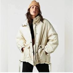 Free People Cream Puffer Coat. New With Tags. Has Cinching At The Waist & Bottom. The Waist Strings Are On The Inside Of The Coat & The Bottom Strings Are Shown On The Outside. New With Tags Oversized Beige Puffer Jacket With Pockets, Oversized Cream Outerwear For Cold Weather, Oversized Beige Puffer Jacket For Winter, Oversized White Puffer Jacket For Spring, Beige Relaxed Fit Winter Outerwear, Beige Relaxed Fit Outerwear For Winter, Cream Relaxed Fit Winter Outerwear, Cream Relaxed Fit Outerwear For Winter, Cream Puffer Jacket With Pockets For Spring