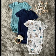 Nwot Unisex 3 Month Bodysuit Bundle Includes: Short Sleeve Blue Bodysuit Short Sleeve Teal Bodysuit Short Sleeve Animal Print Bodysuit All Brand New Without Tags, Never Worn. No Stains Or Flaws, All Items Come From A Smoke Free Home. Bundle For Discount + Save On Shipping! Fitted Blue Short Sleeve Bodysuit For Playtime, Playful Fitted Short Sleeve Jumpsuits And Rompers, Playful Fitted Short Sleeve Jumpsuit, Playful Blue Short Sleeve Bodysuit, Fitted Blue Bodysuit For Playtime, Blue Fitted Bodysuit For Playtime, Blue Fitted Short Sleeve Onesie, Fitted Blue Bodysuit For Playwear, Playful Fitted Blue Jumpsuits And Rompers