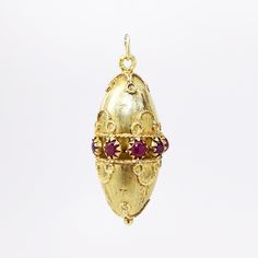 Vintage Italian .750 (18k) Yellow Gold & Ruby Cabochon Pendant/Charm 8.0 grams Eight 3-4mm ruby cabochons (approximate) Mid Century 1.8" long, .75" wide Charm is in very good vintage condition with ono visible wear or flaws. If you have any questions or would like to see additional pictures, please contact us before making your purchase. Buyers outside the United States, please contact us for a shipping estimate. Gold Domed Gemstone Cabochons, Domed Gold Gemstone Cabochons, Yellow Gold Gemstone Cabochons As Gifts, Cabochon Pendant, Vintage Italian, Charm Bracelets, Favorite Jewelry, Ruby, Jewelry Bracelets