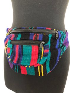 Colourful Bum BagMulti coloured woven acrylic in geometric stripe designs, with two pockets, adjustable strap, and plastic clip fastening.Unique colourful Guatemalan Bum Bags! Each one is different!•.¸´•.¸¸♥*•.¸(¨*•.♥(¨*FREE NEXT DAY FIRST CLASS SHIPPING IN THE UK*¨)♥.•*¨)¸.•*♥¸¸.•´¸.•*¨Emma’s Emporium began in 2006, inspired by direct experiences of Indian culture and generosity. Founded and run by Emma Chance; with a BA Hons in fine art, a love of clothing and textiles, and a passion for trave Casual Multicolor Rectangular Belt Bag, Multicolor Rectangular Belt Bag For Everyday Use, Multicolor Rectangular Belt Bag, Casual Multicolor Belt Bag With Adjustable Strap, Multicolor Belt Bag With Adjustable Strap For Travel, Multicolor Zipper Pouch Belt Bag For Travel, Multicolor Rectangular Belt Bag With Cell Phone Pocket, Multicolor Belt Bag With Pockets For Everyday Use, Multicolor Belt Bag With Zipper Pocket