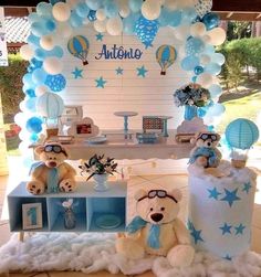 a teddy bear themed birthday party with balloons and decorations