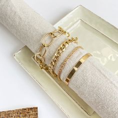 Whether worn alone or layered together, these shimmering bracelets are great for lending a whimsically-golden air to your ensemble. Includes four bracelets Bracelet 1: 2.36" diameter Bracelet 2: 7.48" L Bracelet 3: 6.61" L Bracelet 4: 7.48" L Lobster claw clasp 18k gold-plated copper Figaro Bracelet, Gold Bracelet For Women, Hip Hop Jewelry, Copper Bracelet, Bag Packaging, Bead Strand, Multi Layering, Bracelet Set, Lobster Claw