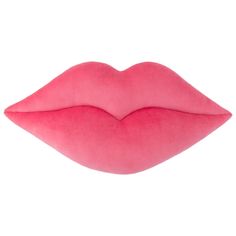 a pink pillow that is shaped like a lips