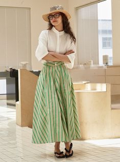 This women's summer green striped maxi cotton a-line skirt is a must-have for your wardrobe. Made of comfortable cotton, this skirt is both stylish and versatile, perfect for various occasions. Features: Made of high-quality cotton material for comfort Green striped pattern ideal for spring, summer, and fall Easy to match with half knits, cotton shirts, tops, and blouses Suitable for daily wear, casual outings, office, beach days, school, or a day out on the street Hand wash in cold water for be Long Umbrella, Maxi Skirts Summer, Umbrella Skirt, Summer Green, Striped Skirt, Half Skirt, Empire Dress, Striped Maxi, Cotton Shirts