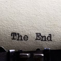 an old typewriter with the word the bad on it's paper and black letters