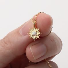 This dainty opal stone necklace with 14k gold plated is the perfect minimalist jewelry to add to your collection.  Perfect as a gift for those who love to wear dainty minimalist jewelry.  Material : Brass, Opal (synthetic stone) Pendant : 13mm x 10mm Opal : 3mm Opal Clavicle Chain Jewelry Gift, Dainty Opal Birthstone Necklaces, Delicate Opal Jewelry Gift, Delicate Opal Jewelry For Gifts, Delicate Gold Opal Jewelry, Delicate Gold Opal Necklace, Gold Dainty Opal Charm Necklace, Dainty Gold Opal Charm Necklace, Delicate Opal Chain Jewelry Gift