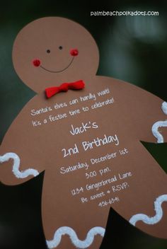 a brown paper cutout with a red bow tie on it