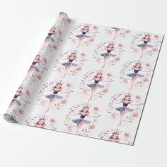 a white wrapping paper with an image of a ballerina in pink and blue on it