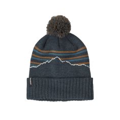 Made with 100% recycled polyester with a textured knit construction, this timeless beanie is itch-free and quick-drying. Made in a Fair Trade Certified™ factory.Made from soft and comfortable 100% recycled polyester with a textured knit constructionThe 3"" rib-knit cuff holds in heat and keeps your hat in placeWith a pom-pom on top, just for funMade in a Fair Trade Certified™ factory, which means the people who made this product earned a premium for their labor Textured Knit, Knit Cuff, Striped Knit, Just For Fun, Fair Trade, Patagonia, Rib Knit, Pom Pom, Cuff