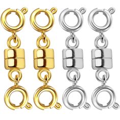 four pairs of gold, silver and black metal clasps with rings on each side