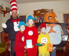 a group of people in costumes standing next to each other