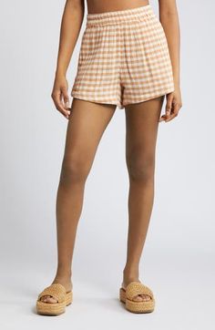 Feel the breeze in these checked elastic-waist shorts crafted from lightweight gauzy cotton that lends texture to your ensemble. Elastic waist 100% cotton Machine wash, line dry Imported Gingham Cotton Shorts For Daywear, Summer Plaid Bottoms For Day Out, Summer Gingham Bottoms With Elastic Waistband, Plaid Bottoms For Spring Vacation, Spring Vacation Plaid Bottoms, Cotton Gingham Pajama Shorts With Elastic Waistband, Plaid Cotton Shorts For Daywear, Plaid Beach Bottoms For Spring, Plaid Bottoms For Beach In Spring