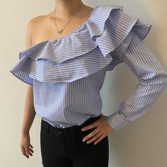 Want &Need Striped One Shoulder Ruffle Top Xs Never Worn Perfect Condition Ask For Exact Measurement! Model Is 5’2ft Fitted Striped Blouse With Ruffles, Spring Sleeveless Off-shoulder Top With Ruffles, Spring Cotton Off-shoulder Top With Ruffles, Blue Off-shoulder Top With Ruffles, Summer Off-shoulder Smocked Top With Ruffles, Blue Off-shoulder Ruffled Top, One Shoulder Ruffle Top, Chic Off-shoulder Ruffled Peasant Top, Ruffle Top