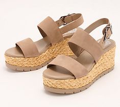 Summer's favorite shoe. These cute leather sandals give you some height and style with a jute-wrapped wedge heel. From Vince Camuto. Spring Synthetic Wedge Sandals With Cork-bed Midsoles, Summer Natural Heels With Cork-bed Midsoles, Natural Cork-bed Heeled Sandals For Summer, Brown Straw Sandals For Spring, Natural Heels With Cork-bed Midsoles For Summer, Spring Sandals With Stacked Heel In Natural Color, Natural Sandals With Stacked Heel For Spring, Casual Straw Sandals With Stacked Heel, Brown Espadrille Sandals For Spring