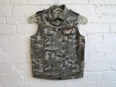 "Khaki Green Vest Military Style Vest Womens Hunting Waistcoat Sequined Camoflage Vest Camo Waistcoat Small Size Label size: S Measurements (laying flat): Length (back): 20\" / 51cm Bust: 17.5\" / 44.5cm Waist:  16\" / 40.5cm Please check measurements to insure a proper fit. Remember to allow yourself some extra room for movement. You can compare these with something from your closet that fits you well. Please convo me if you need additional measurements. Condition: Good Vintage Condition SHIPPING: * I ship worldwide via Priority mail. * I ship from Europe, so please allow 2 to 4 weeks for the package to arrive if you live overseas. * Europe 5 - 10 business days. Please visit my daughter's shop for some more vintage clothing: https://www.etsy.com/shop/VintageWhirlpool" Military Style Khaki Vest For Spring, Spring Military Style Khaki Vest, Khaki Military Vest For Spring, Womens Hunting, Red Velvet Shirt, Style Vest, Green Vest, Velvet Shirt, Vest Outfits