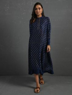 Indigo Flowy Block Printed Handwoven Chanderi Kurta By The Neem Tree now available at Trendroots Indigo Cutdana Kurta For Eid, Indigo Designer Straight Kurta, Designer Indigo Straight Kurta, Indigo Designer Wear Straight Kurta, Indigo Kurta With Dupatta For Eid, Eid Indigo Kurta With Dupatta, Eid Special Indigo Kurta With Dupatta, Anarkali Long Sleeve Kurta With Gota Work, Anarkali Kurta With Gota Work And Long Sleeves