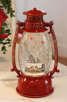 a snow globe sitting on top of a table