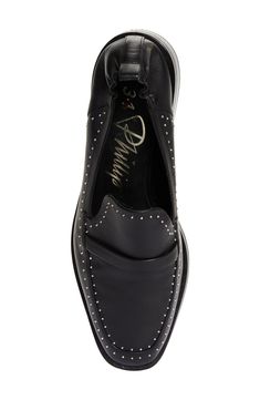 Pinpoint studs trace the sleek lines of this leather loafer and add a bit of edge to the classic style. Leather upper, lining and sole Imported Luxury Leather Loafers With Studs, Luxury Studded Loafers For Formal Occasions, Classic Formal Loafers With Studded Rubber Outsoles, Formal Studded Leather Loafers, Formal Leather Studded Loafers, Formal Leather Loafers With Studs, Formal Slip-on Loafers With Studs, Elegant Studded Leather Loafers, Elegant Stud Leather Loafers