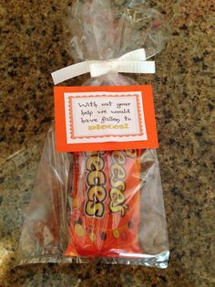 a candy bar wrapped in plastic on top of a counter