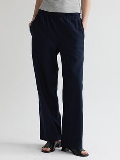 Composition : 40% Linen 45% Rayon 15% PolyesterCountry of Origin : CHINA Navy Casual Bottoms For Work, Navy Relaxed Fit Bottoms For Business Casual, Navy Casual Pants For Business Casual, Indigo Wide Leg Pants With Elastic Waistband, Navy Cotton Pants With Straight Hem, Navy Straight Hem Pants For Business Casual, Navy Bottoms With Relaxed Fit And Straight Hem, Navy Bottoms With Pockets And Straight Hem, Navy Business Casual Pants With Straight Hem