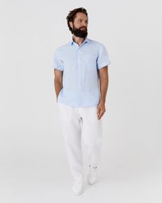 This classic short-sleeved linen shirt VERBIER in sky blue is made from lightweight linen and comes with short sleeves, cuffed hems, and white river shell buttons. It includes one chest pocket and side vents, adding a touch of style to the design. Details: * Regular fit * Shirt-style collar * Short sleeves * White shell button closure * Features one chest pocket * Includes slits on the sides * Centre back length: 30" (76cm) * The model is wearing a sky blue color shirt in size L (Paired with white pants PALERMO in size XL https://etsy.me/3QXOaXF) and is 6'1" (186 cm) tall. Model measurements: Bust: 41"/104cm | Waist: 33"/85cm | Hips: 41"/105cm * The model is wearing a white color shirt in size L (Paired with natural melange pants PALERMO in size XL https://etsy.me/3QXOaXF) and is 6'1" (186 Blue Colour Shirt, Mens Linen Outfits, Blue Linen Shirt, Short Sleeve Linen Shirt, White River, Button Up Shirt Mens, Mens Linen, Shell Buttons, Summer Clothing