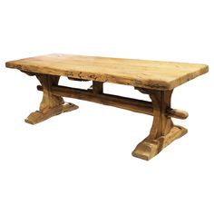 an old wooden table with two legs and a large slab on the top, against a white background