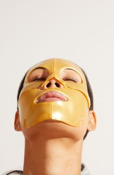 What it is: A face mask formulated with powerful ingredients including collagen, hyaluronic acid, retinol and bakuchiol.What it does: This mask delivers a burst of youthful radiance from the inside out, helping restore your natural beauty while bringing a bit of sparkle to your self-care routine. How to use: Begin with a clean, freshly washed face. Gently remove the mask from packaging and apply over your face. Leave on for 15–30 minutes, remove the mask and gently massage excess serum into the Coconut Oil Mask, Jlo Glow, Skin Gym, Golden Box, Golden Mask, Gold Face Mask, Collagen Facial, Turmeric Face Mask, Gold Face