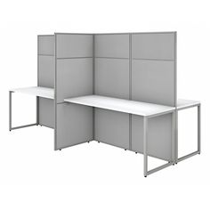 an office cubicle with two dividers and one desk on the other side, in grey