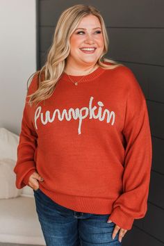 Fit & Details: Oversized, relaxed fit. If in-between sizes, you could size down. Soft knit material with an embroidered "pumpkin" detail along bust Round neckline Drop shoulder sleeves Measurements: Small: Bust 46“ Length 25“ Medium: Bust 48“ Length 26“ Large: Bust 50“ Length 27“ Fabric & Material Care: Hand wash cold. Hang or line dry. 100% Acrylic. *Imported* Model Info: Leah is modeling a large. Britta is modeling a small. Casual Embroidered Sweater For Fall, Casual Halloween Knit Sweater, Embroidered Knit Tops For Fall, Embroidered Crew Neck Sweater For Fall, Fall Cotton Orange Sweater, Embroidered Long Sleeve Sweater For Fall, Orange Knit Tops For Fall, Sweater Pumpkins, Black Pumpkin