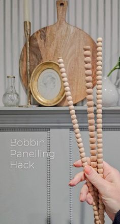 The hottest design trend for 2024, this DIY wood bobbin trim for your board and batten will change the game! It's such a fun and darling addition to your wall paneling and it's perfect for a bedroom, playroom or entryway. You can even add them to dressers and cabinets! Bobbin Moulding Wardrobe, Bobbin Trim Panelling, Bobbin Bead Moulding, Beaded Trim Ideas, Bobbin Molding, Bobbin Panelling, Bobbin Trim, Bobbin Furniture, Bobbin Frame