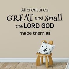 a wall decal that says, all creatures great and small the lord god made them all