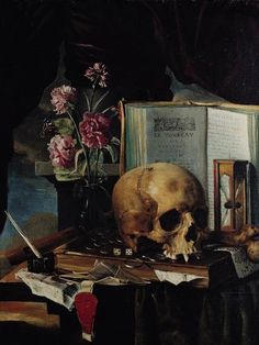 a still life with a skull, flowers and an open book