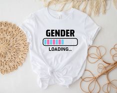 "Gender Loading Shirt, Gender Reveal Party Shirt, Gender Reveal Shirt, Gender Reveal Party, Gender Reveal TShirt,  Team Boy and Girl Shirt HOW TO ORDER 1) Select desired shirt type, size, and color. 2) Choose desired number (quantity) of shirts. 3) If required, enter personalization into the personalization text box. 4) Click \"Add to Cart.\" If you want multiple shirts, repeat steps 1 through 3 for each shirt. If not, you can complete the checkout process. Handling time is typically 1-3 business days.  We don't accept RETURNS or EXCHANGES, but if there is something wrong with your order please message us so I can help you. We don't guarantee sending the same brand shirt shown in the listing." Born In The 90s, Mother Days, 90s Theme Party, English Teacher Gifts, Gender Reveal Shirts, Jesus Gifts, 90s Theme, Funny Mother, Teacher Tees